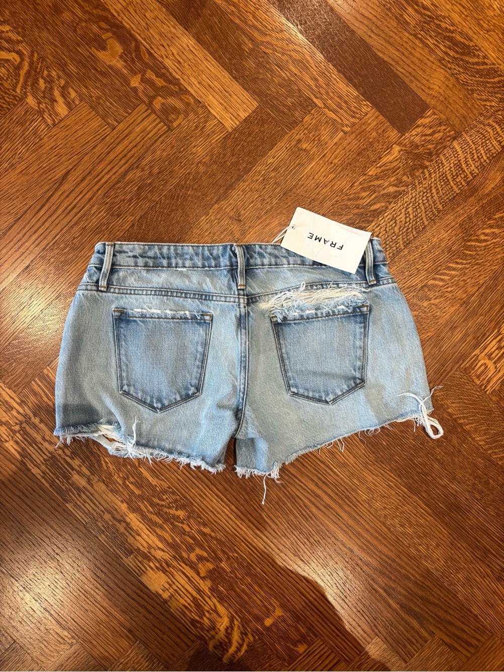 Frame Denim Light Wash Distressed Cutoff Shorts